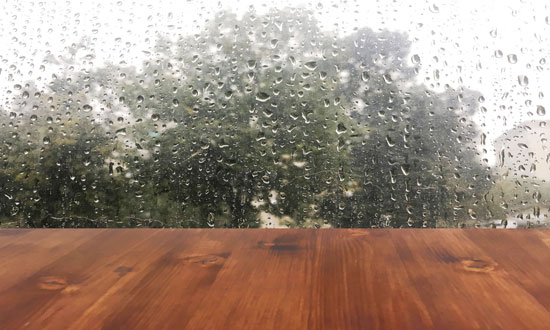 wood next to a rainy window