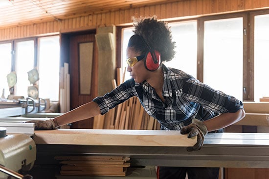 female carpenter in her workshop