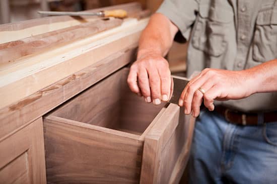 woodworker making wooden drawers