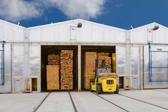 forklift with wood and warehouse